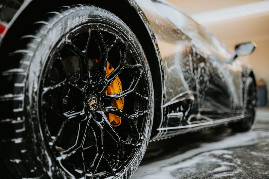 Premium shiny clean sports car showcasing high quality car wash results